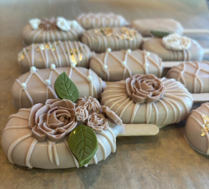 Blue and white marble cakesicles with gold leaf details